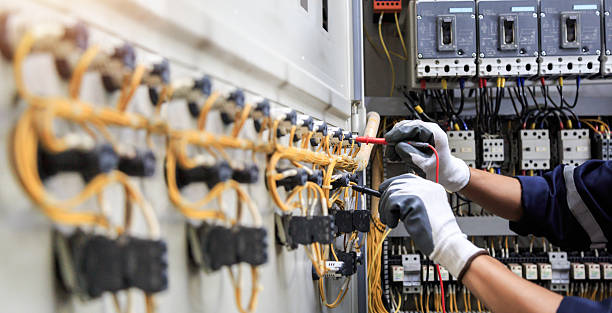 Professional Electrician technician working in Moundville, AL